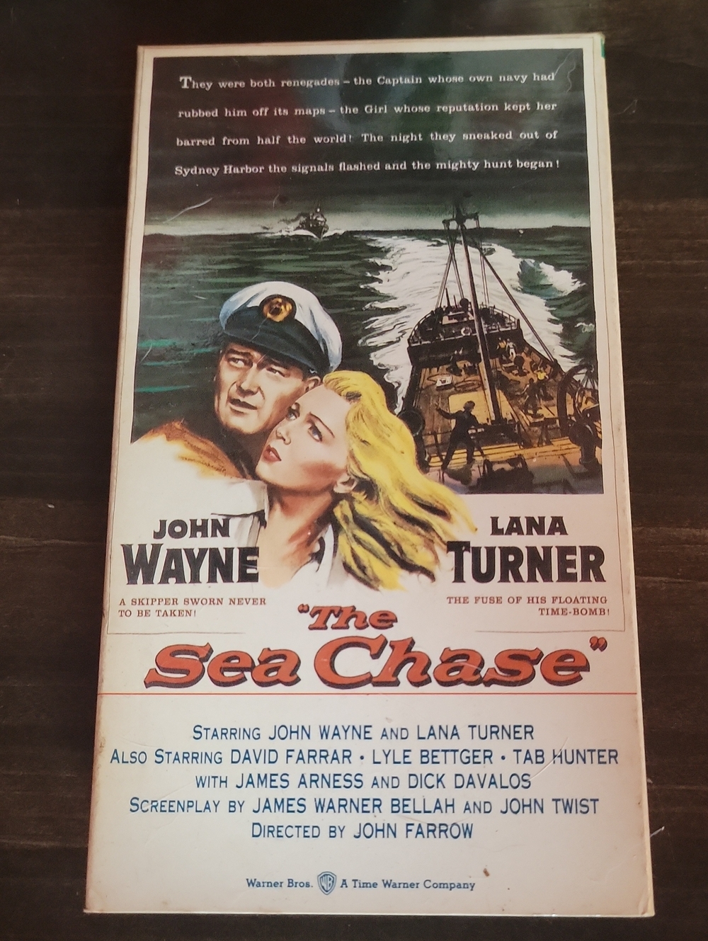 The Sea Chase VHS Movie - John Wayne & Lana Turner (Yellow, Blue, White)